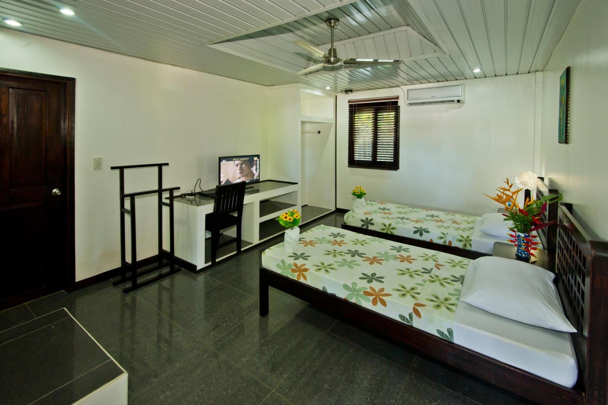 Balay Tuko Garden Inn Puerto Princesa Rom bilde